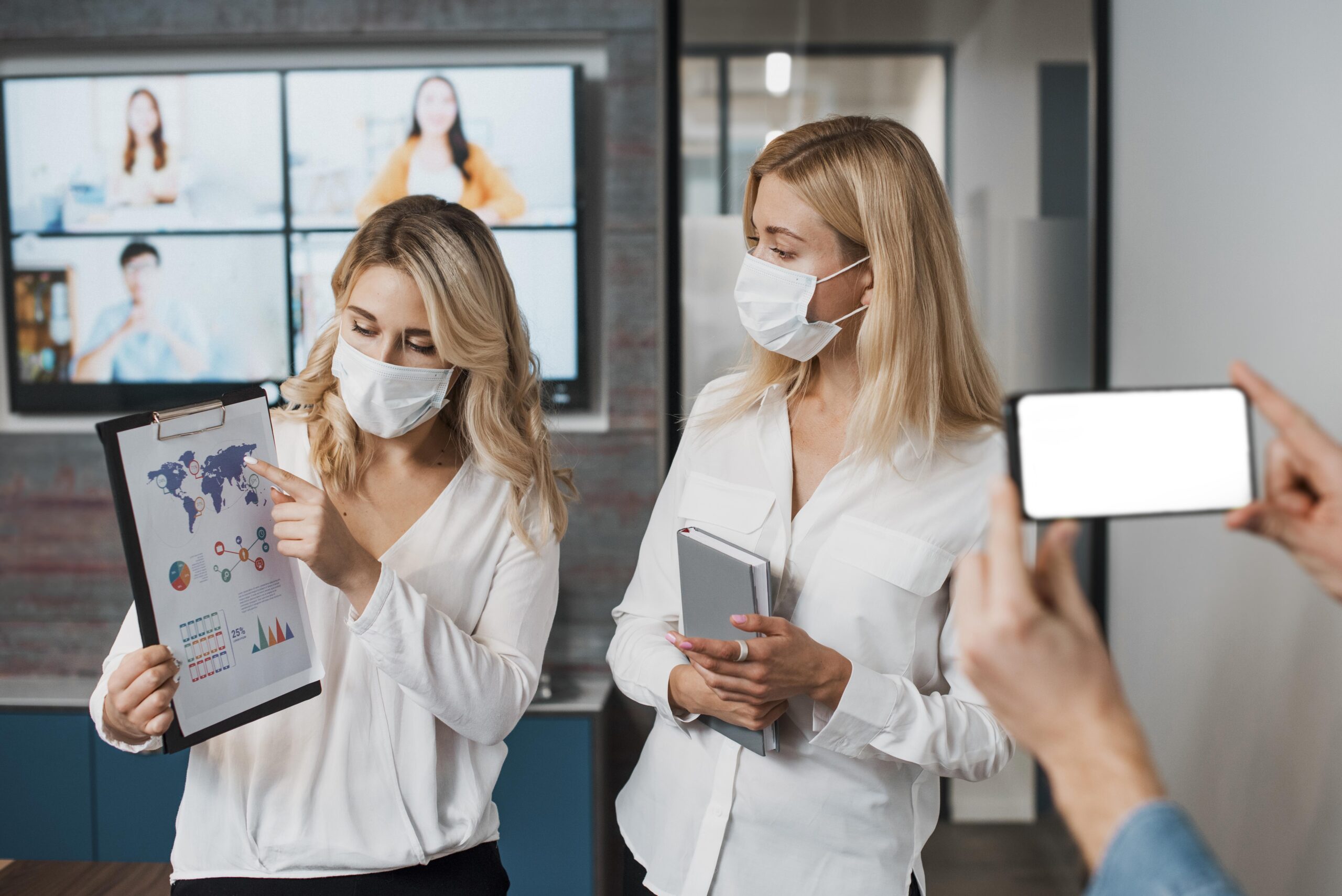 beautiful businesswomen wearing medical masks